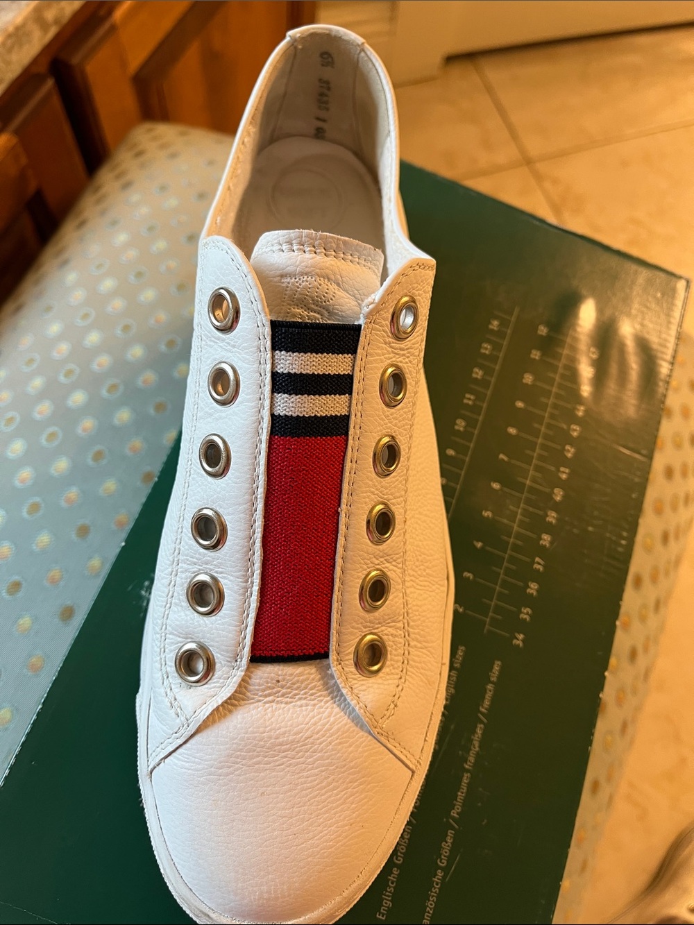 Womenโs White Slip-On Sneakers with Red & Navy Elastic Panel